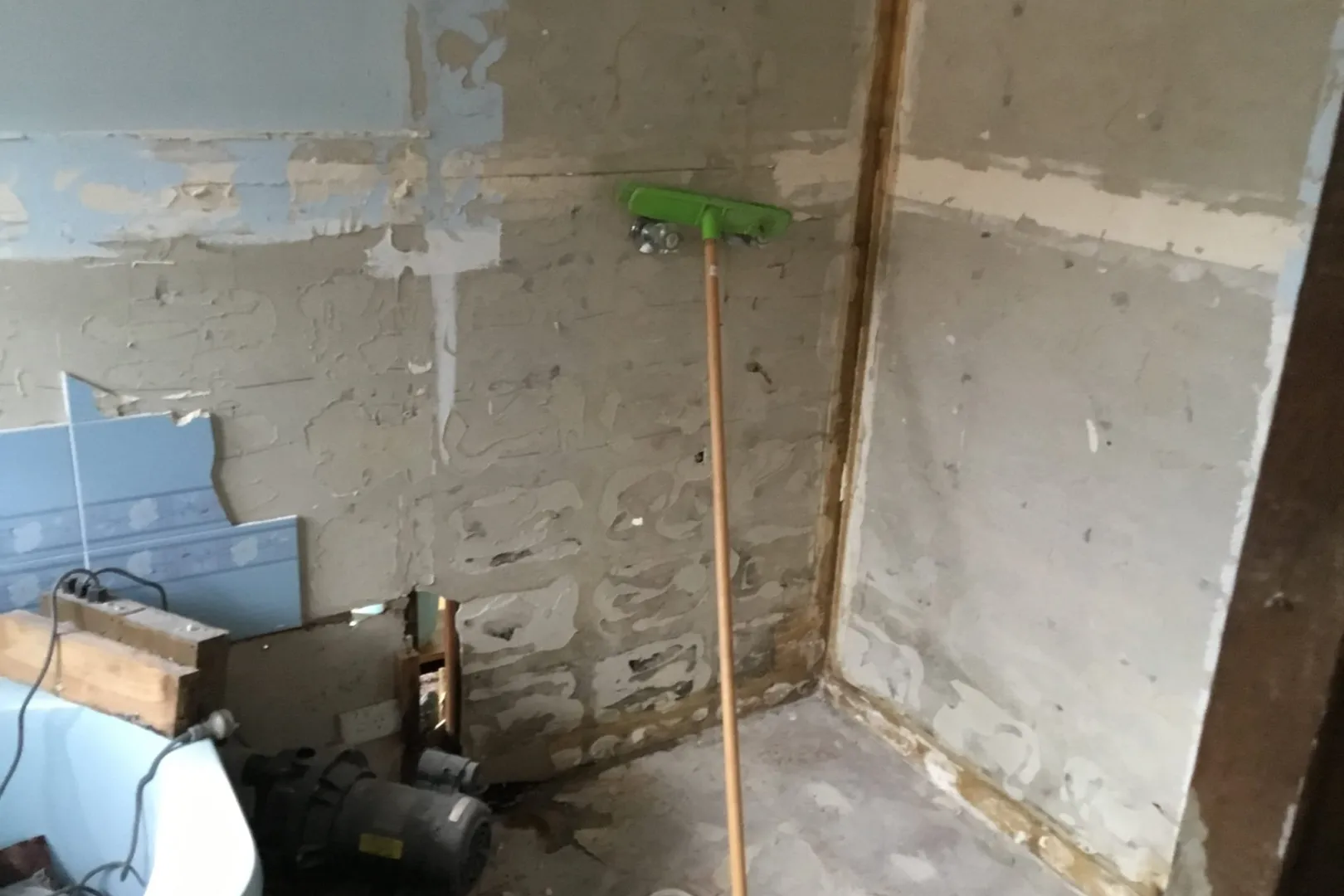 Bathroom stripped back to the wall during a renovation